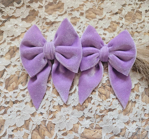 Purple velvet bows