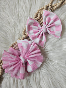 Pink checkered bows